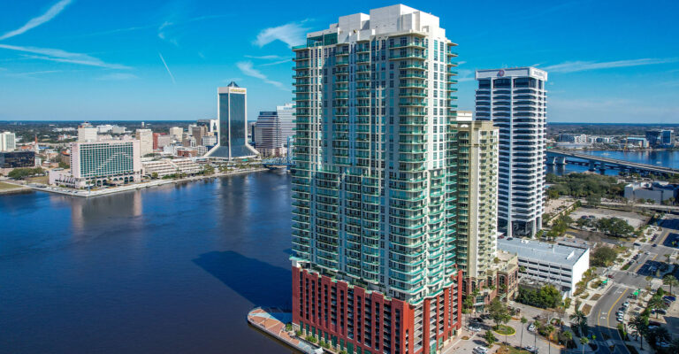 The Peninsula of Jacksonville Condo - Insurance Appraisal & Reserve Studies - FPAT Aerial View of the Peninsula High Rise Condominium on the Jacksonville Southbank Riverfront Representing a Client Property for a Reserve Studies Company and Insurance Appraisal Services